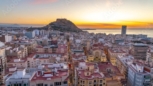 Timelapse of Alicante cityscape at sunset with Santa Barbara Castle.