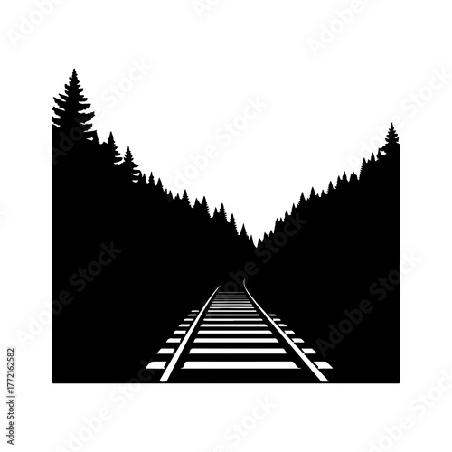 Railway tracks receding into forested mountains