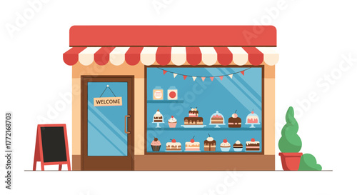A welcoming bakery storefront with a charming striped awning displays an array of delicious cakes and pastries in its window.