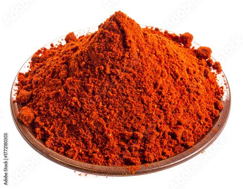 Ground Paprika Powder in Isolated Dish for Culinary Use