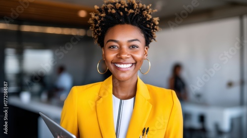 Energetic businesswoman smiling confidently in a modern office environment professional lifestyle portrait