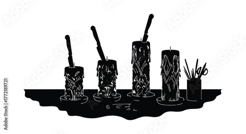 Melting candles with knives inserted, illustrating decay and danger