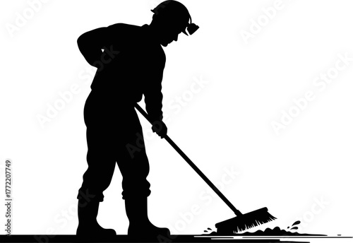 unsung industry hero diligently clears debris, preparing the way for progress