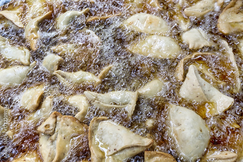 Frying Samosa Or Singhara In Hot Vegetable Oil