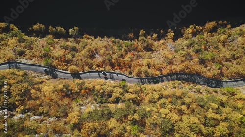 Winding Cliffside Road Through Autumn Mountains in New England