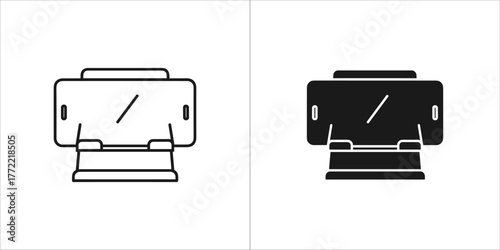 Black and white illustration of a smartphone on a stand