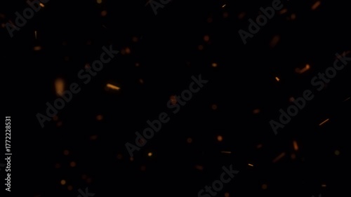 Atmospheric Burning Embers and Sparks Floating in the Dark.