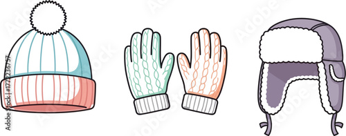 Winter clothing set with a beanie gloves and a trapper hat on a light background