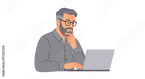 Man with beard and glasses using a laptop, thinking.