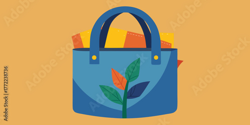 Recycled denim tote bag with decorative leaves on orange background  