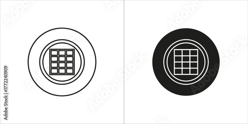 Top view of a floor drain in black and white