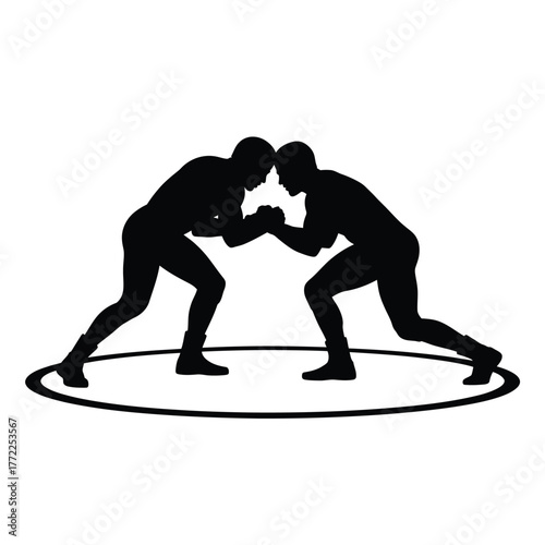 Two wrestlers silhouetted in a ring facing each other