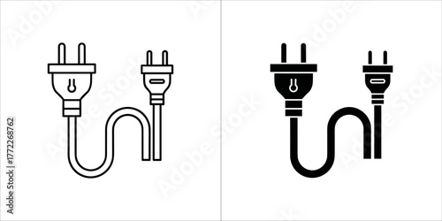 Two electrical plugs connected by a cable