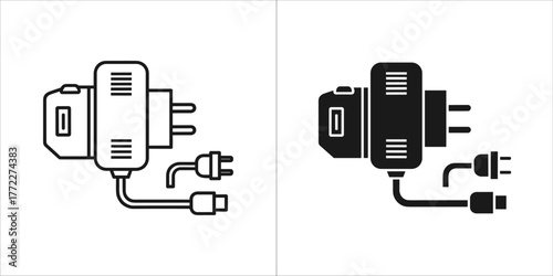 Two icons of a power adapter with plugs, one outline and one solid black