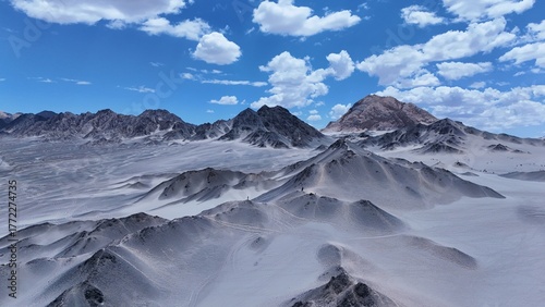 Black Mountain desert mountain landscape,Black Mountain peaks under blue sky,Majestic and desolate scenery of Black Mountain,Black Mountain scenery on the western plateau,Black mountains with blue sky