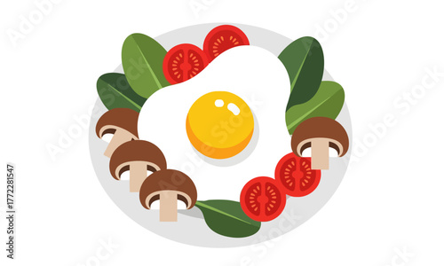 Healthy breakfast plate with fried egg spinach tomatoes and mushrooms.