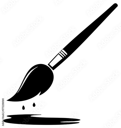 Artistic brush releasing drops of paint onto surface in black and white design for creative design