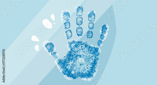 Frozen handprint on glass creating a unique winter art