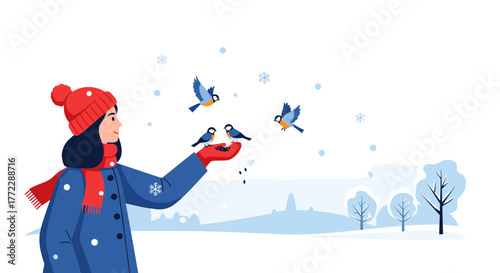 Girl feeding birds gently in snowy winter landscape