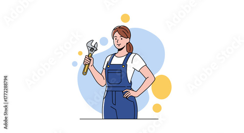 Woman plumber confidently holding an adjustable wrench, ready for plumbing tasks