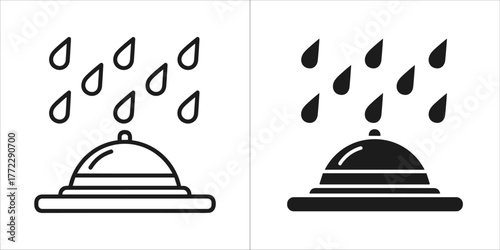 Bellhop bell under rain for hotel service