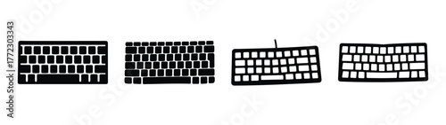 Collection of four diverse computer keyboards showcasing different layouts and designs