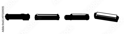 Four black cylindrical objects with ribbed ends, isolated on a white background