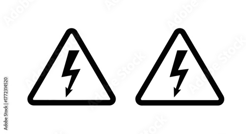 Two black and white triangular warning signs featuring lightning bolts