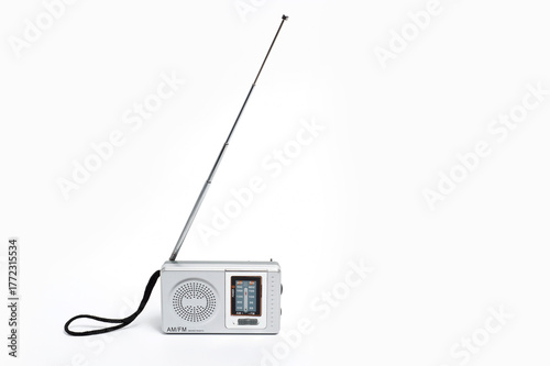 Portable battery-powered AM/FM radio photographed against a white background.