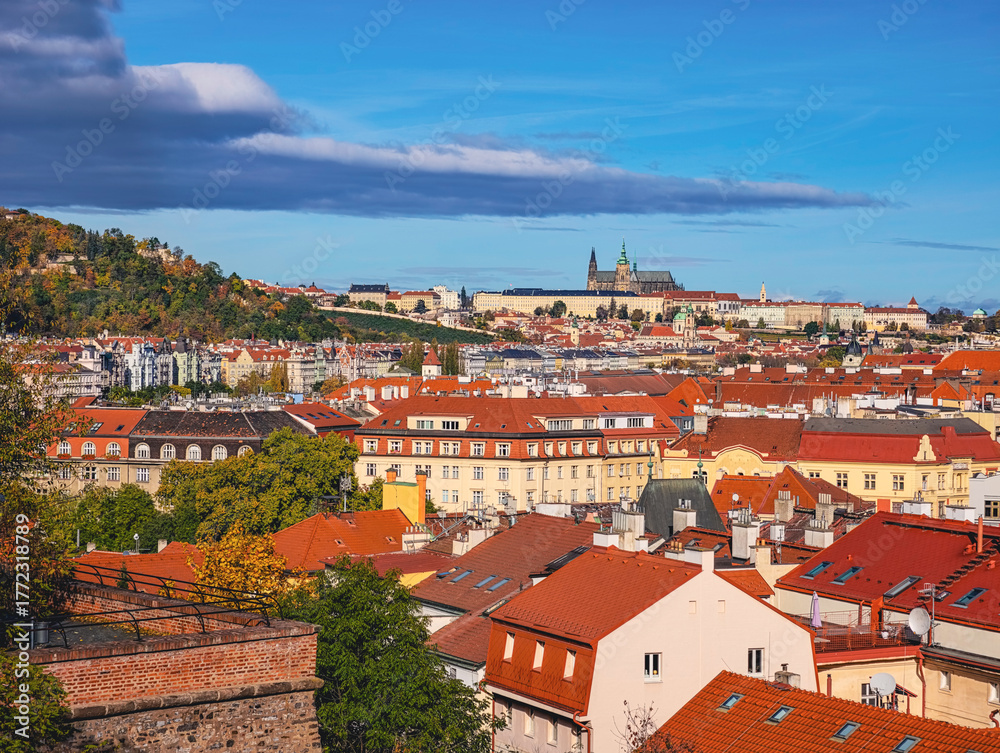 Obraz premium Prague Cityscape Panorama Red Tile Rooftops Castle Skyline Historic Architecture Czech Republic Travel Destination European City Aerial View