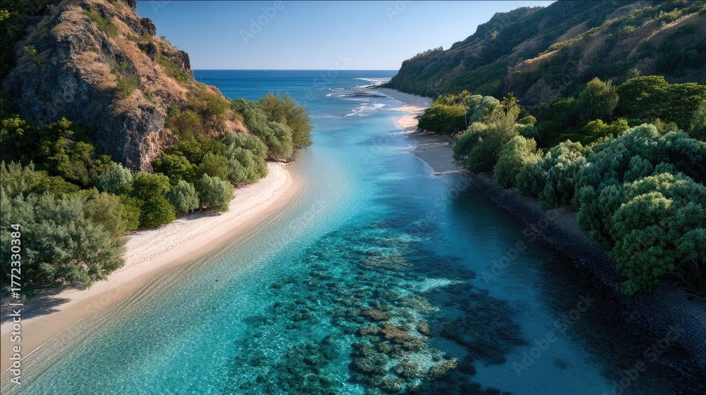 Fototapeta premium Drone Aerial View of a Tropical Lagoon Inlet Bordered by Lush Green Hillsides and Sandy Shores Under Bright Sunlight