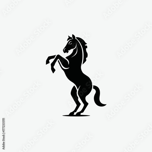 Dynamic black horse silhouette rearing on hind legs, a powerful and elegant equestrian animal icon or symbol design