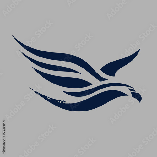 Dynamic stylized eagle or hawk in flight silhouette. Abstract bird symbol on a neutral gray background, representing freedom, power, and vision.