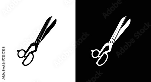 A black and white illustration of tailor's shears shown in positive and negative space.