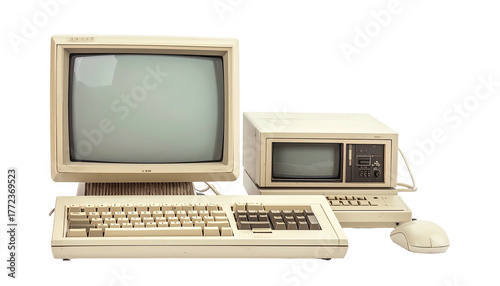 Beige retro computer system with a monitor, keyboard, and mouse