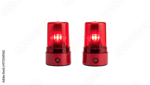 Two red cylindrical emergency lights glow on black