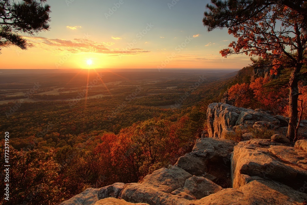 Fototapeta premium Breathtaking Sunset View from Petit Jean State Park in Arkansas Overlooking Autumn Mountains and Forest