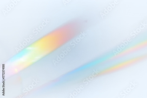 Crystal rays shimmer with rainbow reflections over transparent layers. Lens flare adds motion and luminous depth. Ideal for abstract or festive illustrations. PNG