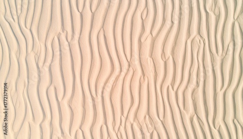 Fototapeta Naklejka Na Ścianę i Meble -  Aerial View of Beige Sand Dunes with Ripple Pattern