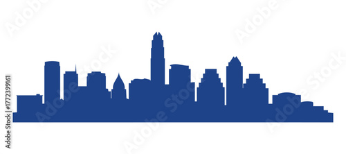 Silhouette of the Austin skyline. A blue design of the city of Austin set against a white background.