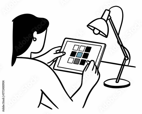 Woman using a tablet with a grid pattern