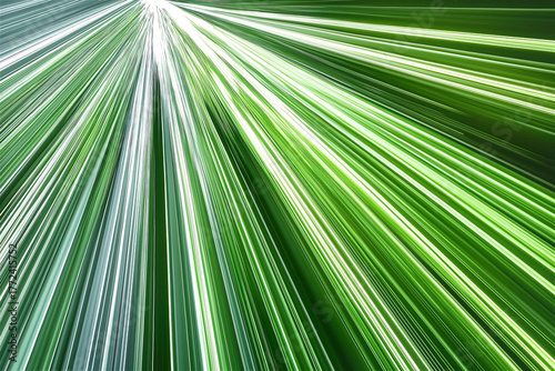 Dynamic green light rays forming an energetic burst pattern on dark background. Abstract motion and speed theme with futuristic tech concept and copy space.