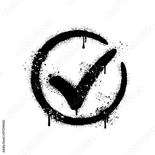 Black and white graffiti stencil of check mark in circular frame