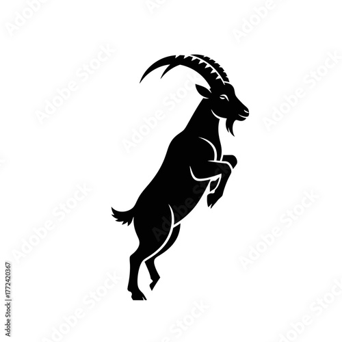 Majestic goat silhouette leaping with powerful grace and elegance.