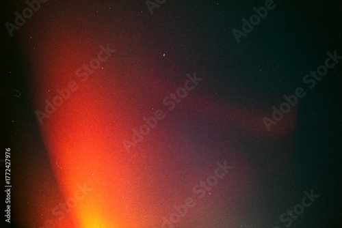 light leak overlay effect with blur red light leaks,retro noisy film texture light leak flare on black background,grunge old film burn texture with ray,abstract background with orange bright light