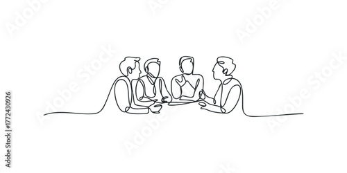 Four people in discussion around a table