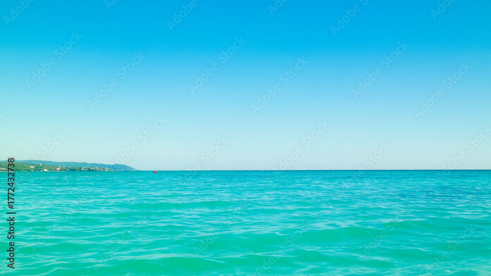 Fototapeta premium Blue water of Tyrrhenian sea in Vada, Tuscany, Italy.