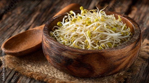 Mung bean sprouts filling rustic wooden bowl