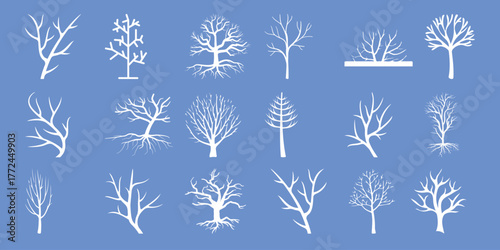 Collection of stylized white bare tree silhouettes on a blue background