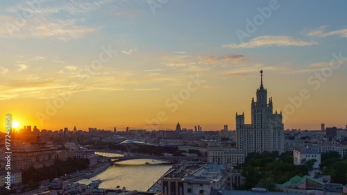 Aerial timelapse of Zaryadye Park and Kremlin in Moscow with river reflections at colorful sunset
